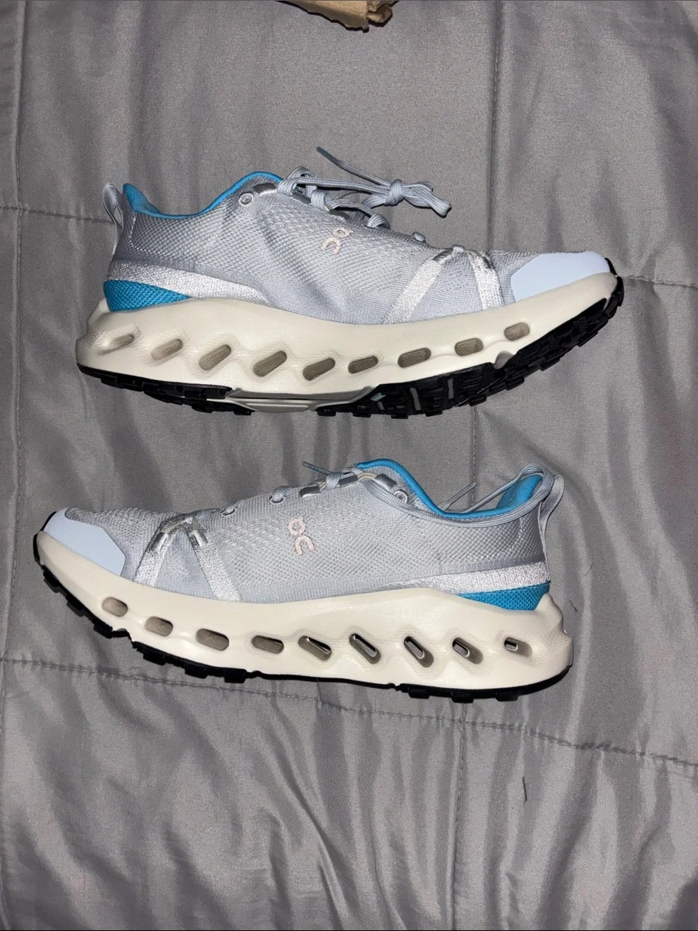 On Running Women's Sneakers in Light Gray with Blue Accents
